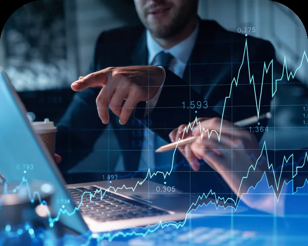 Analyst reviewing share performance charts